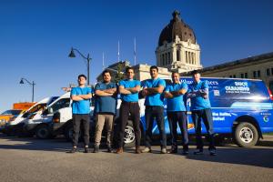 The Blue Brothers team with its fleet at the Saskatchewan Legislative Building in Regina.
