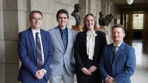 Four newly sworn-in Berry Law attorneys stand together inside the Nebraska State Capitol in Lincoln after the October 2026 swearing-in ceremony.