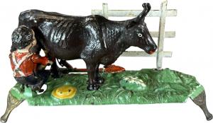 J&E Stevens Milking Cow mechanical bank, scarcer thin-base version from the manufacturer’s desirable series of pedestal banks. All original. Sold for $12,000