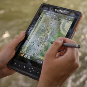 Alta Rugged Tablet with water on screen and EMR stylus