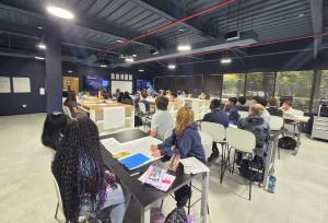 Students seated in a classroom at Carolina Collegiate High School in Durham, North Carolina.