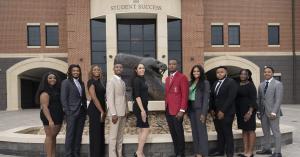 Alpha Xi Gives scholars