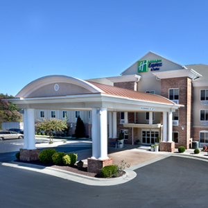 Exterior view of the Holiday Inn Express & Suites High Point South in Archdale, NC, managed by Daly Seven near the High Point Market.