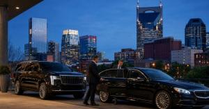LuxNashRide Nashville chauffeur service with luxury sedan and SUV against the downtown Nashville skyline