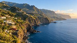 Terraced homes on a sea cliff