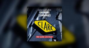 Clark Influence yellow storefront sign with The Globe and Mail Canada's Top Growing Companies 2026 badge