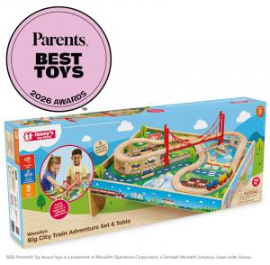 Jasey's Toy Chest Wooden Big City Train Adventure Set & Table in its box, showing a wooden play table with figure-eight track, a red suspension bridge, and a city scene, with the pink Parents Best Toys 2026 Awards seal above it.