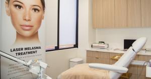 Laser treatment room at Omnia Wellness Center in Encino, California, with Fotona equipment and treatment chair.