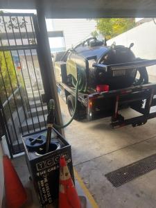 Professional used cooking oil pickup at a San Diego commercial kitchen