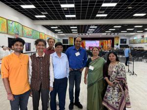Group of community and organizational participants at the HMEC 2025 conference venue in Irving, Texas.