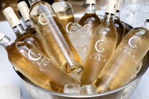 Maison Cala rosé bottles chilled on ice at the Maison Cala Monaco pre-launch event.