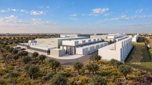 Aerial view of data centre with car parking and landscaping