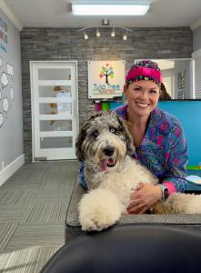 South Bend dentist Dr. Nicole Hurcomb Tulip Tree Dental Care with therapy dog Meatball