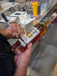 Writing the Number of the Bottle by Hand