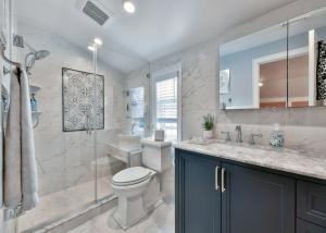 Lori Miller, LGC Interiors shared, this house was a full gut renovation. The bathroom was a welcome addition to what is now the primary suite and helped her clients survive a complete demo during Covid.