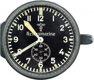 German Kriegsmarine ship (or instrument) clock, manufactured by Junghans, has a strong and legible black dial with Arabic numerals and hands, 3 inches in diameter. Estimate: $400 - $700