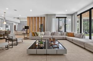 Hawthorne Model Home main living area with high ceilings, open living spaces, and abundant natural light.