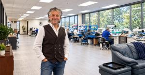 Photo illustration of Leo Varshavsky, owner of Durable Dental Lab, shown in a laboratory setting to represent the company’s Buffalo Grove expansion.