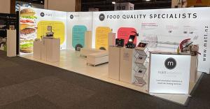 10x20 trade show booth with branded display walls at an exhibition
