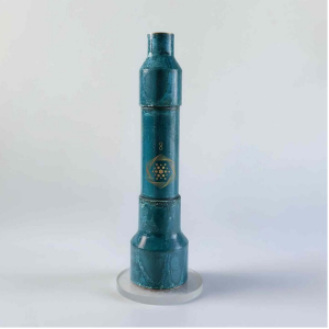 Aqua Energizer structured water device with a teal patina finish and gold sacred geometry emblem