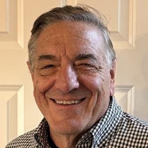Portrait of Dr. Joseph A. DeFeo, Chief Quality and Advocacy Officer at ComplianceQuest.