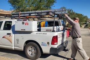 Anteater Exterminating technician treating a Chandler, Arizona home