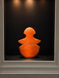 "Dawn" by Alexander Aboutaam is a brass sculpture representing the origins of his artistic career. It depicts an abstract figural form.