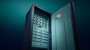 Low-angle view of the Mercier & Fils Régent XL Tiphaine watch safe, with twenty winding positions, turquoise drawers and an open quilted door.