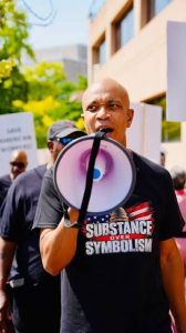 Rev. Dr. Delman Coates at the "Substance over Symbolism" Rally