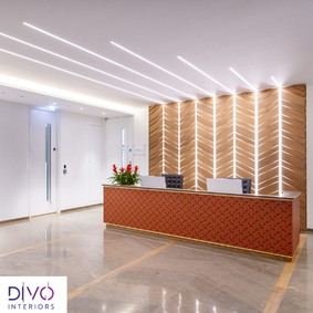 Modern dental clinic reception with a wood-slat feature wall