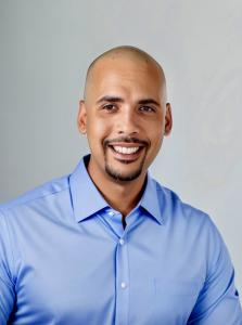Studio headshot of Dr. Zakk Varughese, author and real estate broker