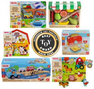 Six Jasey’s Toy Chest wooden toys around the Oppenheim Toy Portfolio Best Toy Award Gold Seal: Vehicles Puzzle, Slice & Play Fruit Crate, Farm Easy-Grasp Peg Puzzle, Press & Pop Toaster Set, Off to the Rescue Vehicle Carrier, and Farm Puzzle