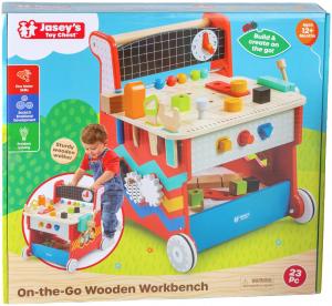 Jasey’s Toy Chest On-the-Go Wooden Workbench in its retail box, a Good Housekeeping 2026 Toy Awards winner and 23-piece wooden push-walker and workbench for ages 12 months and up