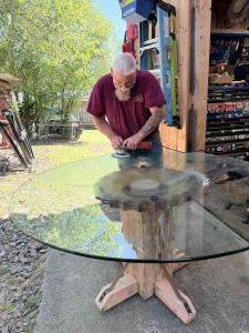 Image of Carl Nelson building a wooden table
