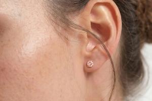 Model wearing With Clarity's new pink diamond stud earrings