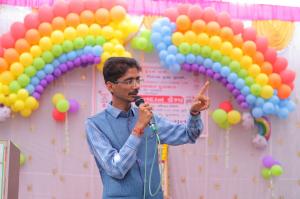 A speaker addresses attendees at a blood donation camp organized at the Gram Panchayat Office in Dulsad village, Valsad district, Gujarat, on December 17, 2023.