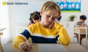 Child in School struggles with ADHD Brain Balance can help