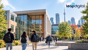 A group of students walking towards the college