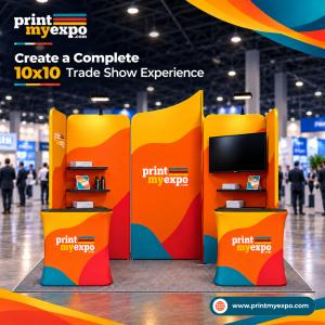PrintMyExpo 10x10 booth with branded panels, counters and lighting.