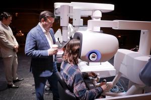 Dr. Daniel Wigmore shows a Rutland County, Vermont student how the da Vinci 5 Surgical System works during a medical procedure at an event in October.