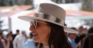 Amanda Allen, Co-Founder of HeadWest Branding Bar, wearing The Hudson hat from the exclusive HeadWest Reserve Collection in collaboration with Italian hatmaker Tacchino Hat Co. Photo Credit: Allan Zepeda Photography.