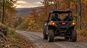 Side-by-side UTV with turn signals and brake light on, driving a gravel county road through Ozark fall forest