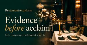 RestaurantAward.com launch banner with forest-green and gold typography beside a candlelit dining room.