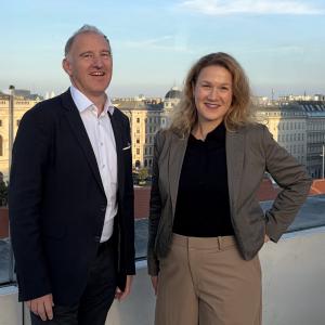 Maya Koleva and Thomas Netousek pictured with a Vienna skyline behind