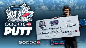 Powerball Putt winner Graham Clawson with his $10,000 check