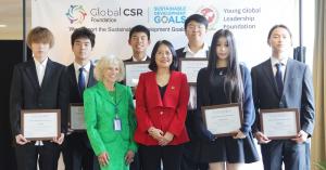 Seven young leaders hold Global Young Leadership Award certificates at the 2026 Global CSR Summit at the United Nations