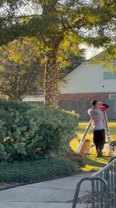 Crews install commercial-grade LED lights using proper equipment.
