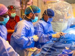 KFSH cardiology team performing a cardiac catheterization procedure