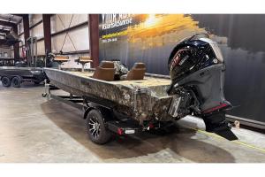 Rear view of camo Excel EX 203 aluminum boat with Yamaha SHO outboard motor at Sunrise Marine Center showroom