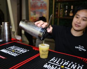 A taste of the action! A bartender pours a cocktail featuring Tanduay rum at last year’s SoCal Cocktail & Spirits Fest. Join us October 24 at Gillette House in Irvine for spirits tastings and more! Tickets: https://sipawards.com/cocktail-spirits-fest/